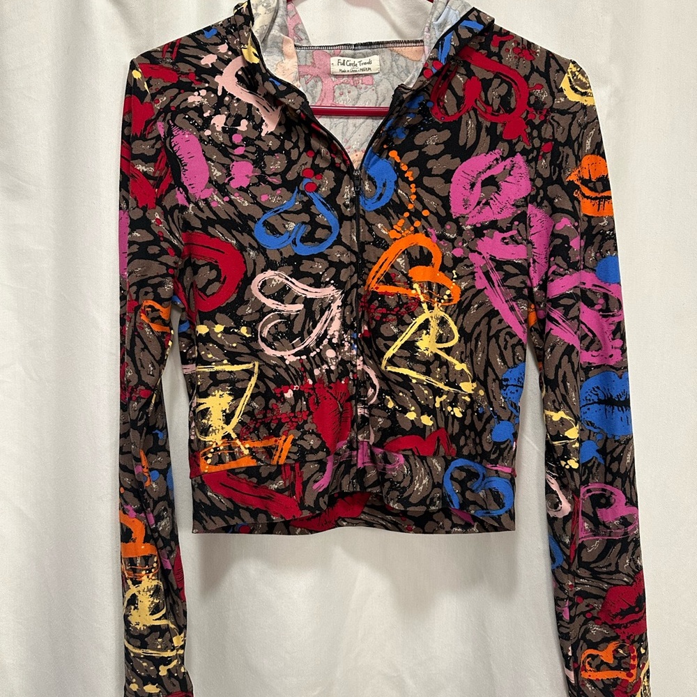 Full Circle Threads cropped jacket.